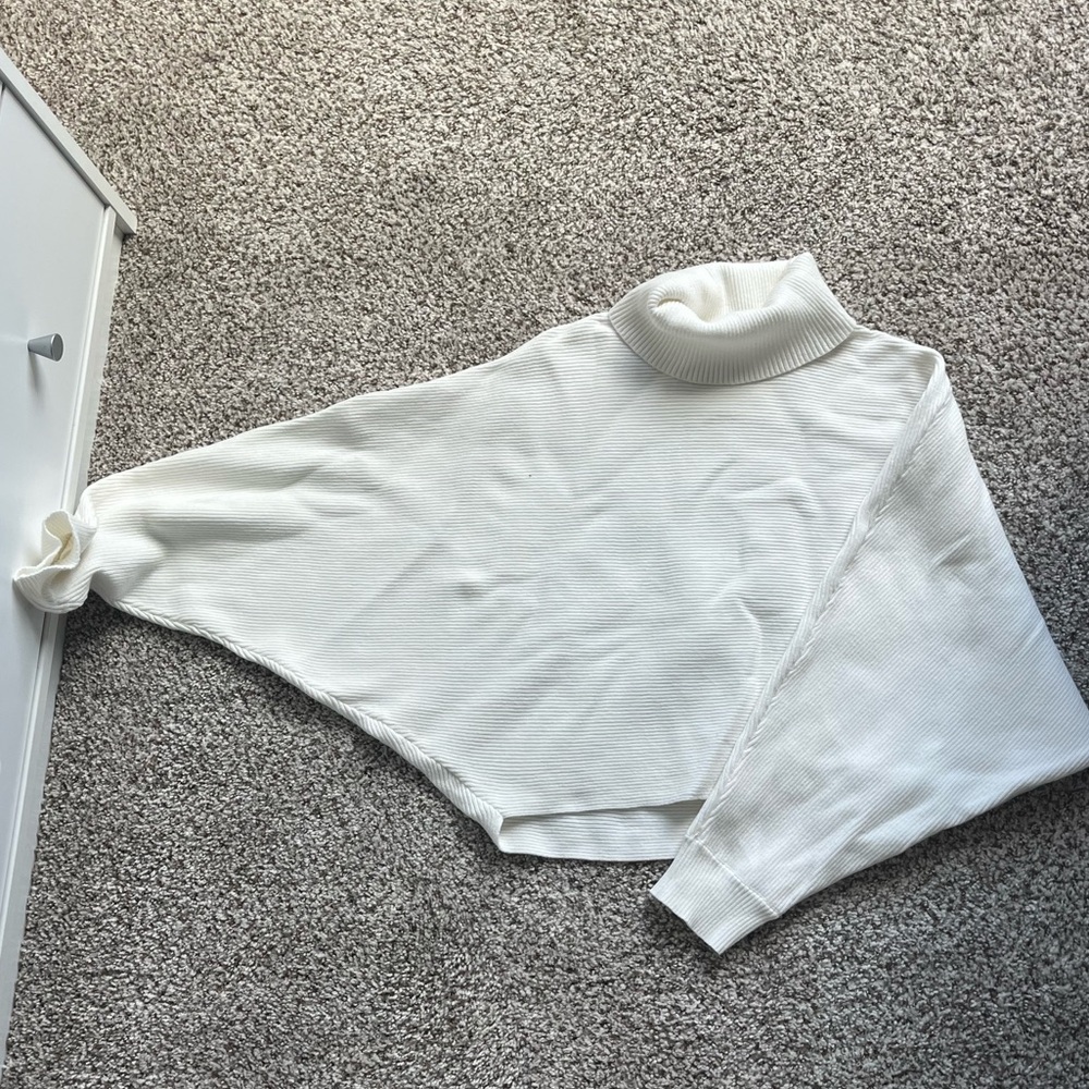 White turtleneck sweater